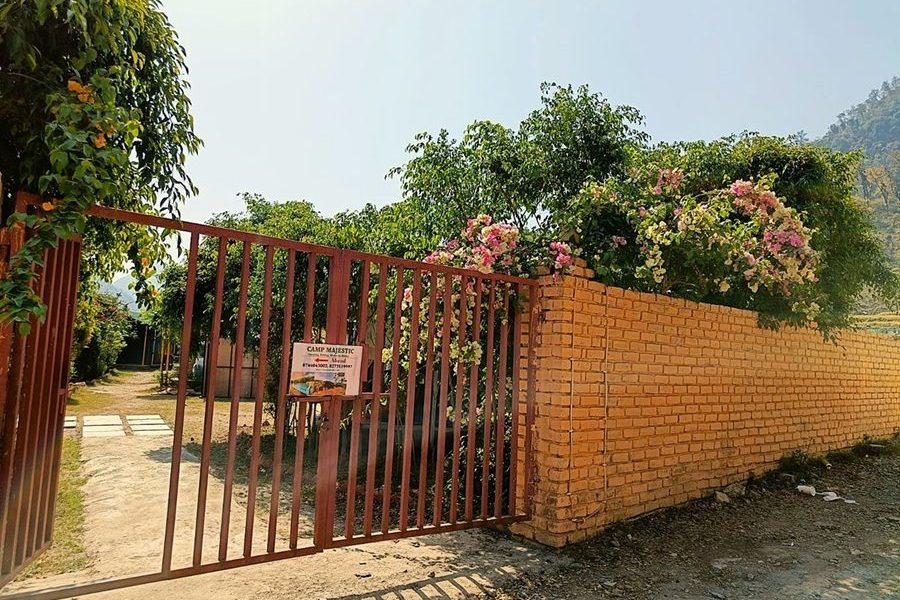Camp Majestic entryway with a welcoming and scenic view.